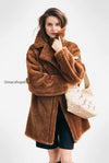 mid-length-teddy-style-shearling-coat-with-lapel-collar